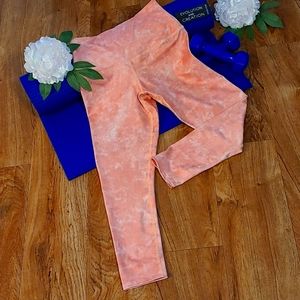 Evolution and Creation leggings in size S.